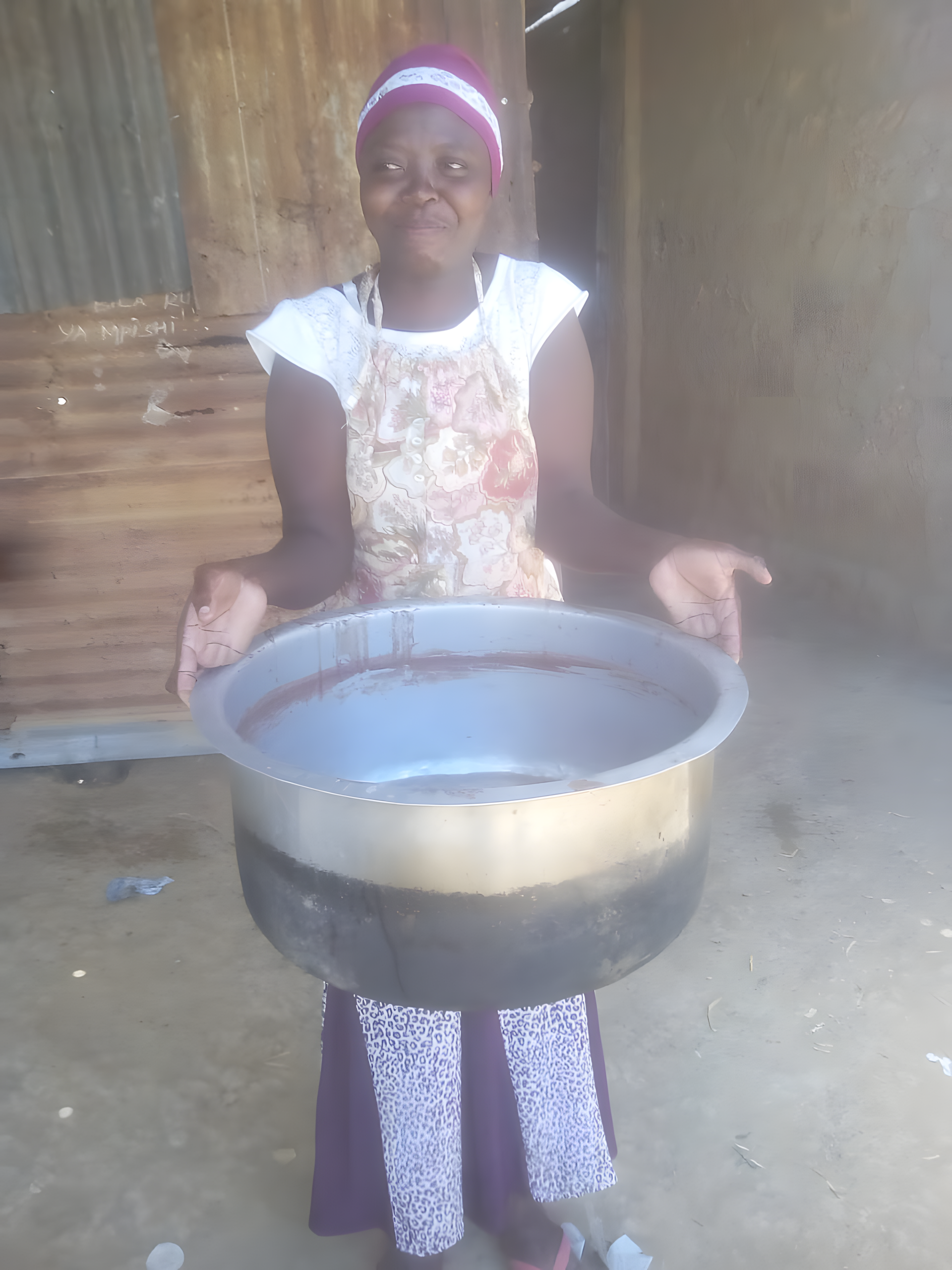 Woman with cooking pot